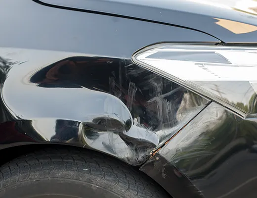 close up of a damaged wheel arch